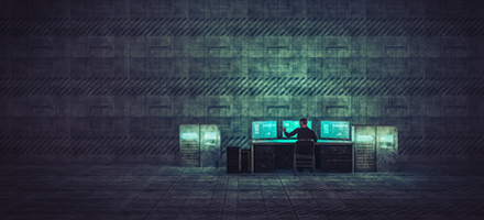 Datahacker in front of a computer